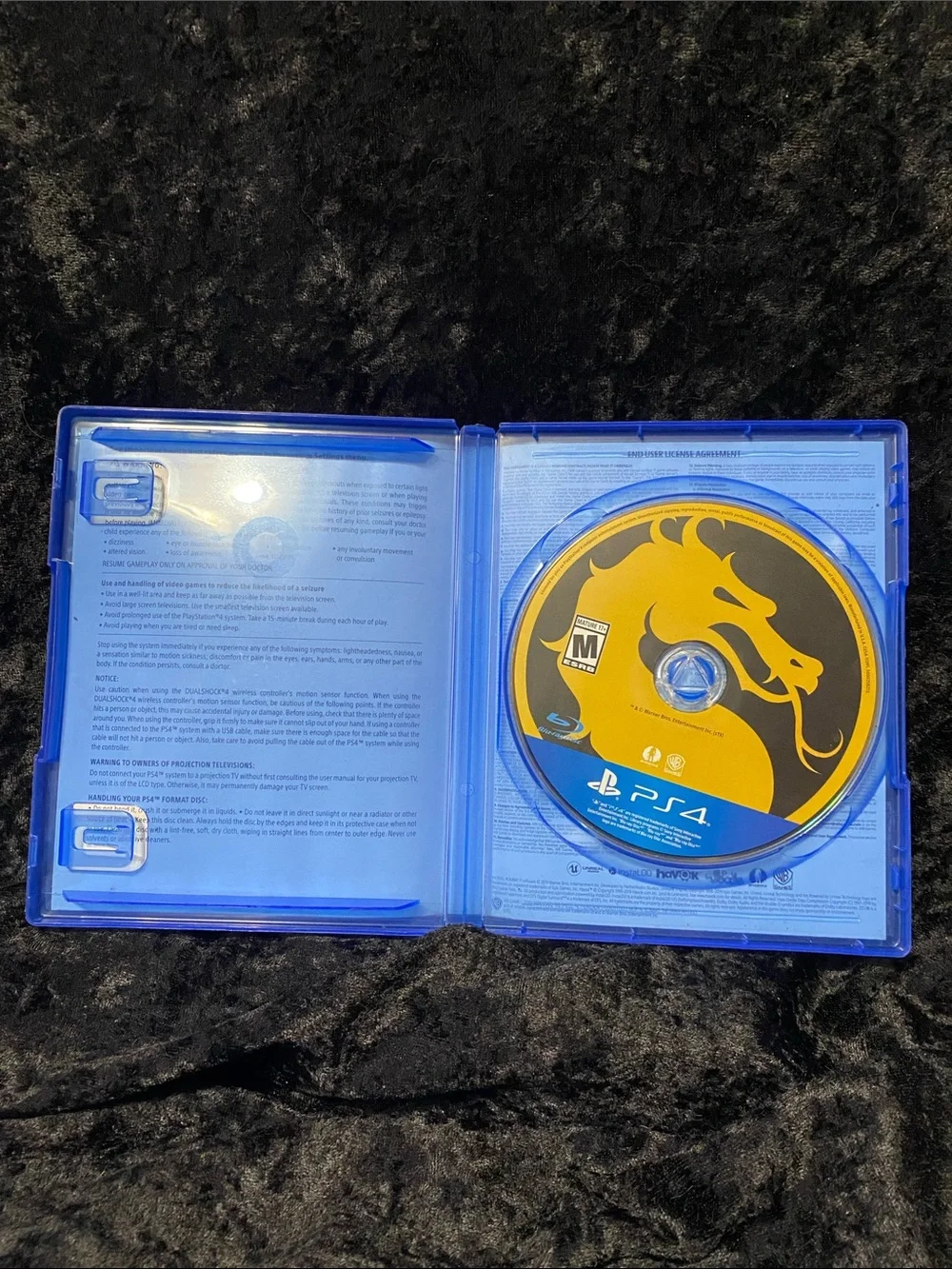 Sony PS4 Game Case with Blue Shell and Yellow Accents
